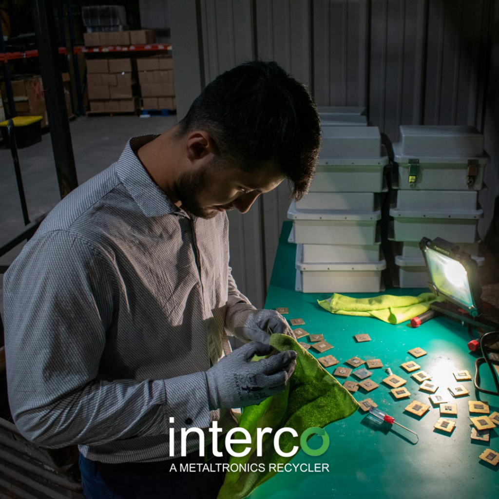 Person inspecting recycled CPUs