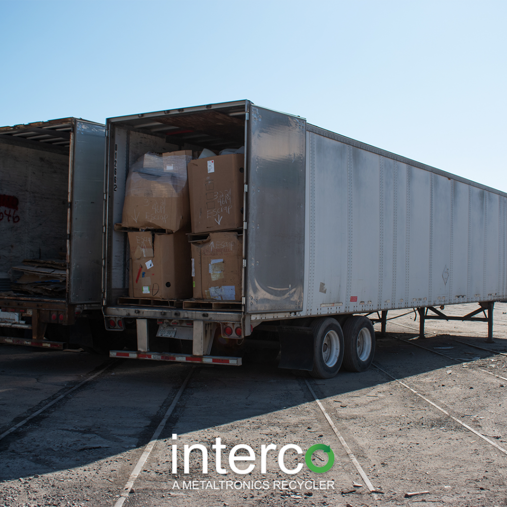 Straight load truck filled with recyclable material