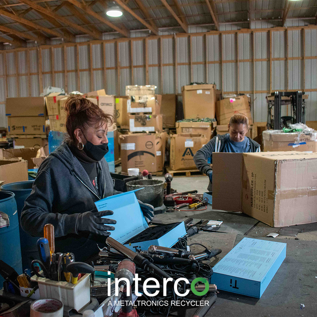 Individuals working in a warehouse environment